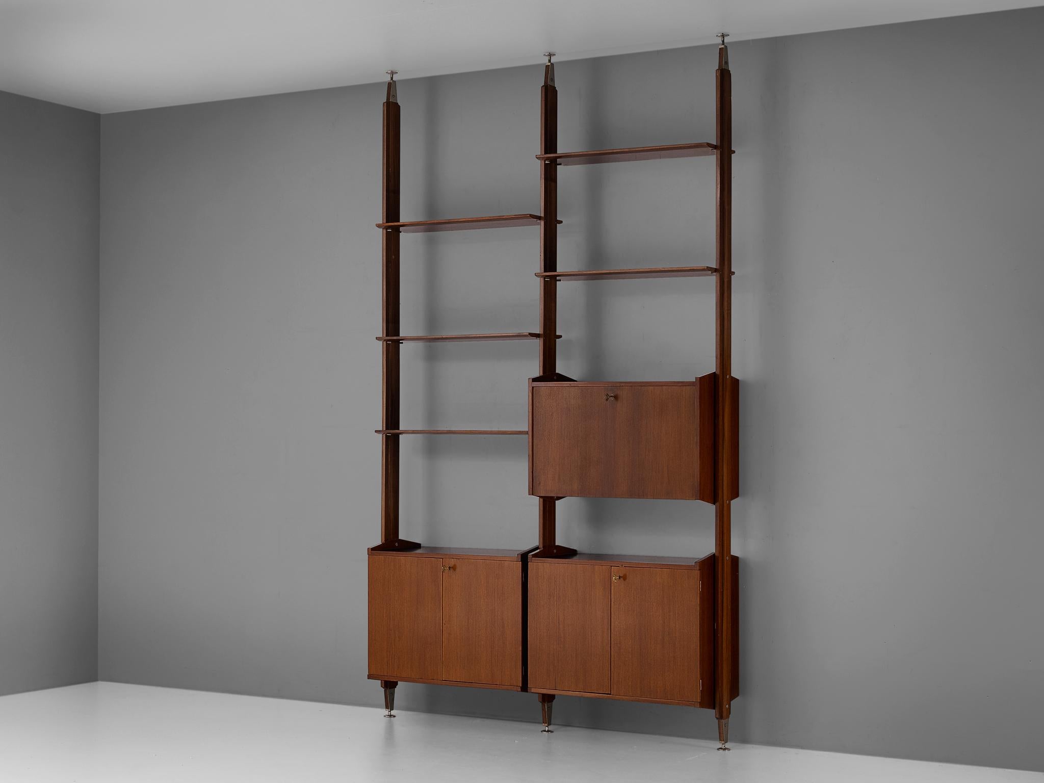 Modular wall unit or room divider, walnut, metal Italy, circa 1960

This versatile Italian wall unit is executed in walnut and can be used as a bookcase, room divider and cabinet all at once. The exact height is adjustable because of the metal legs