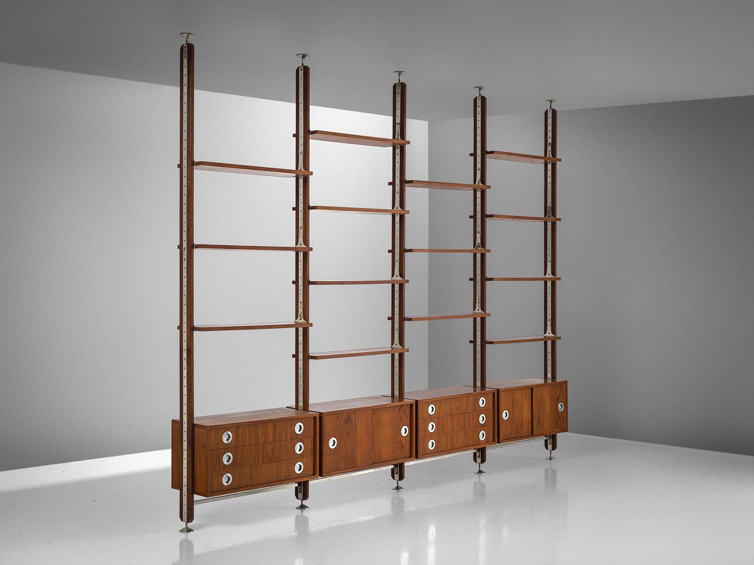 Room divider, walnut and metal, Italy, 1960s.

This walnut veneered unit features four elements cabinets and several shelves that are adjustable according to your own preference. The cabinet is freestanding because it is finished on the back. The