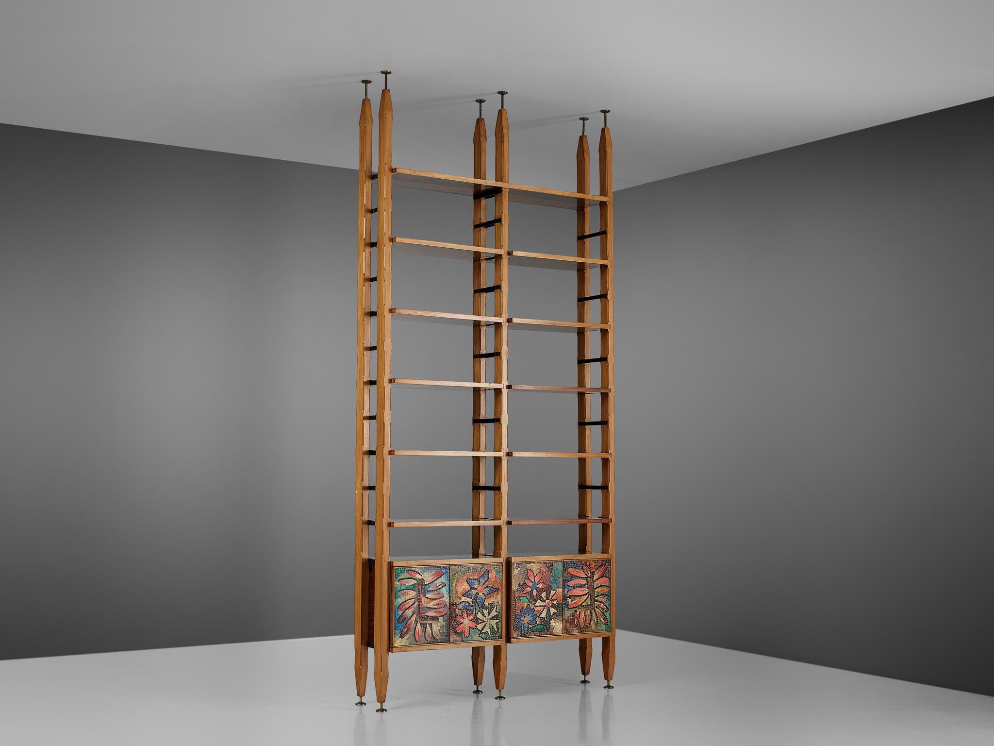 Wall unit / bookcase, beech, wood, brass, mosaic, metal, Italy, 1960s

This unique and exceptional bookcase of Italian origin is a great example where both aesthetics and functionality come into play; elegant in line and practical to use for