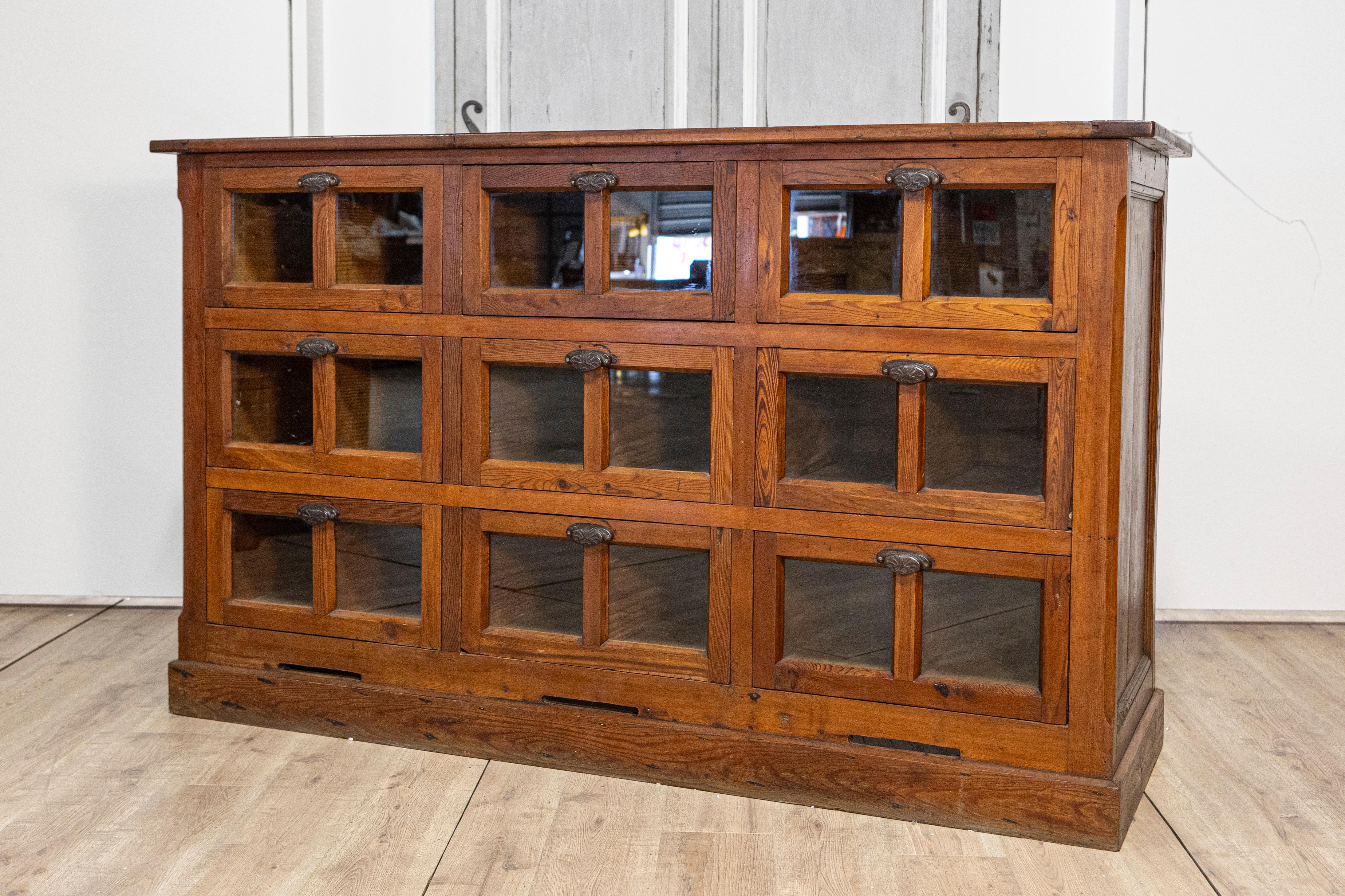 Italian Walnut and Iron Pastaia Shop Cabinet with Nine Drawers and Glass Panels For Sale 1