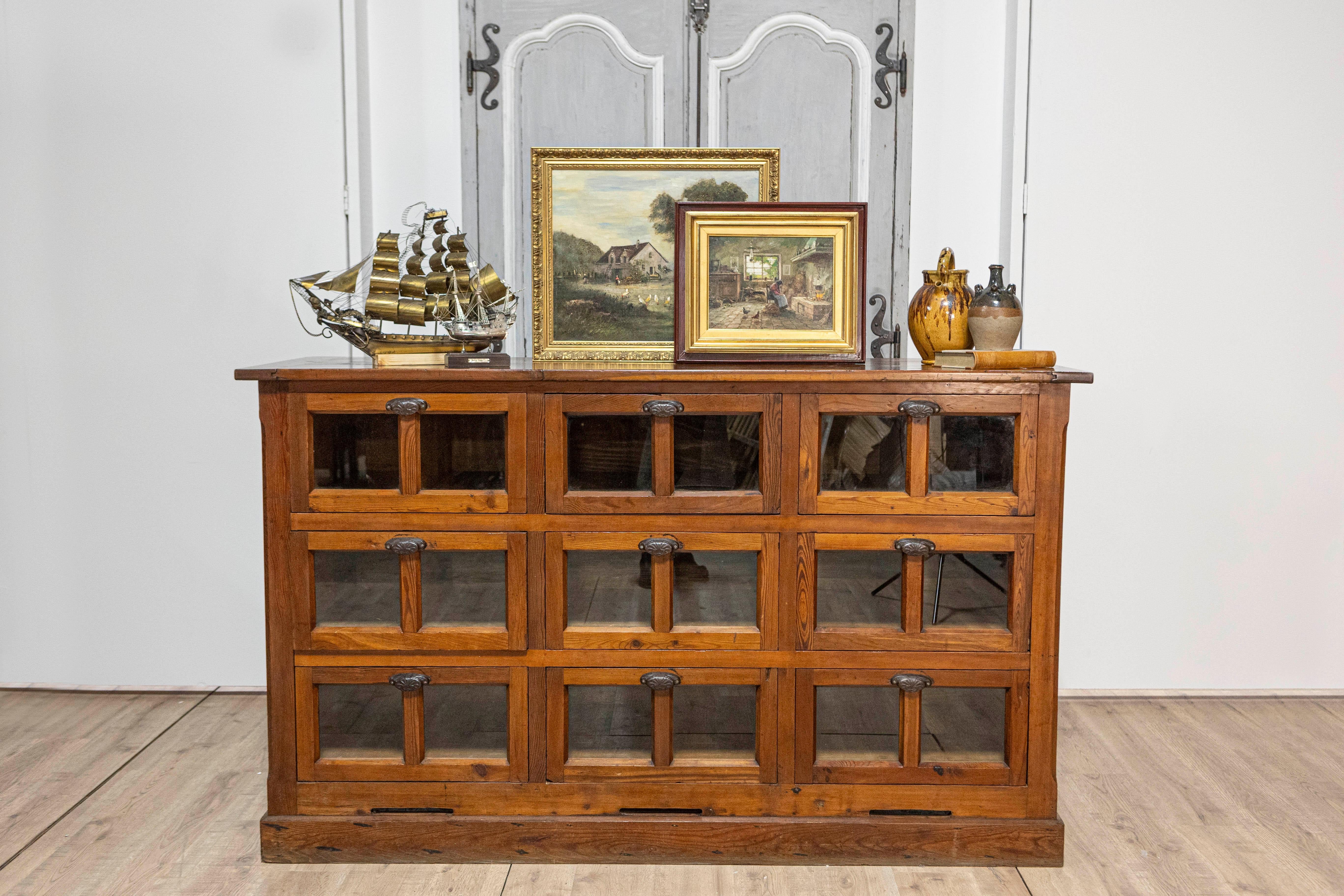 Italian Walnut and Iron Pastaia Shop Cabinet with Nine Drawers and Glass Panels For Sale 4