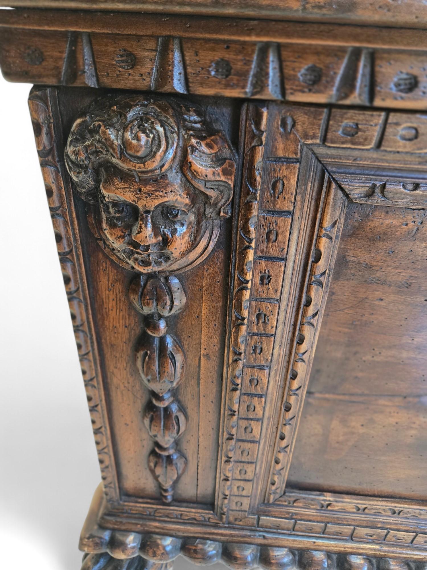 Hand-Carved Italian walnut cassone 17th C. For Sale