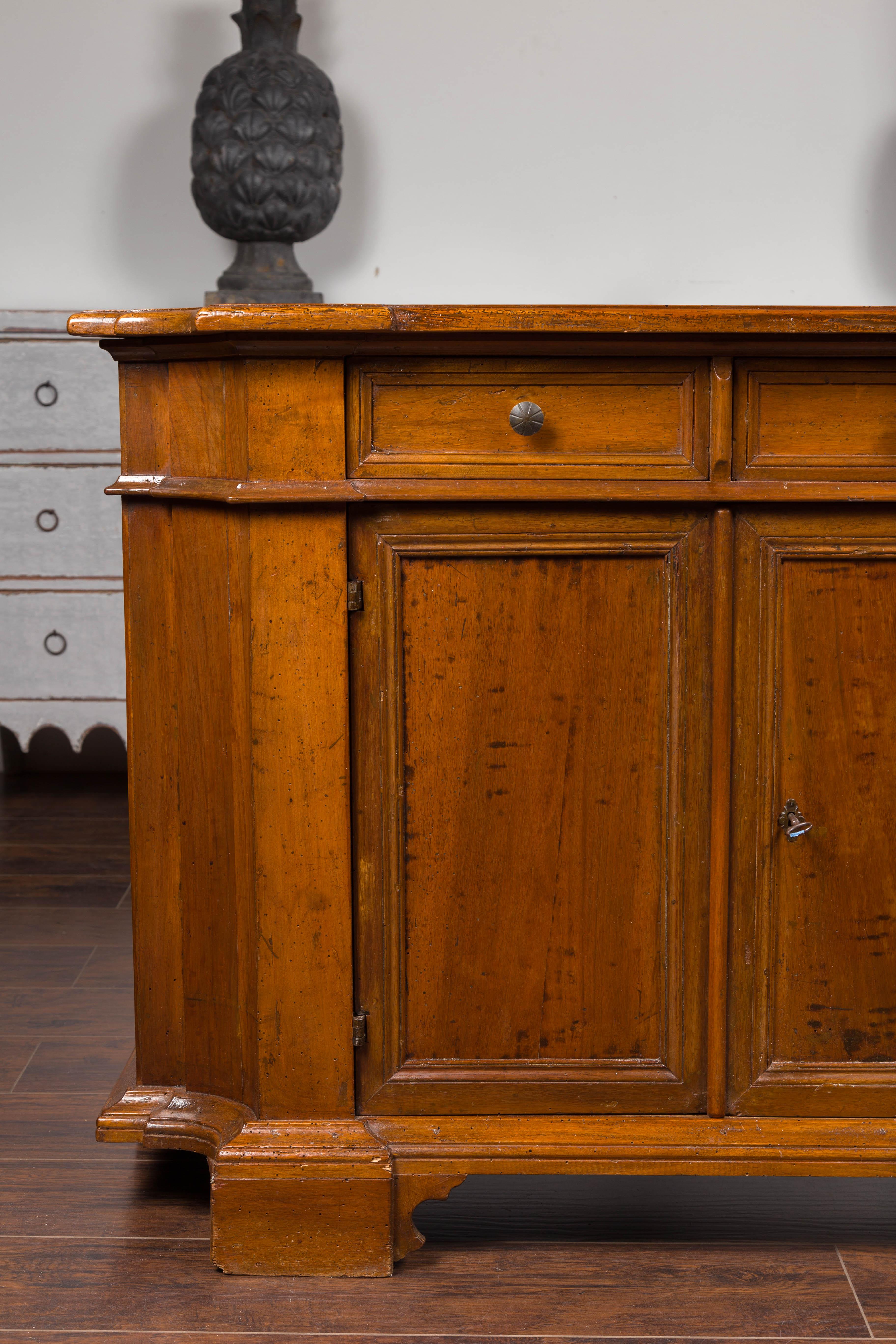 Italian Walnut Credenza with Drawers over Doors and Curving Sides, circa 1860 2