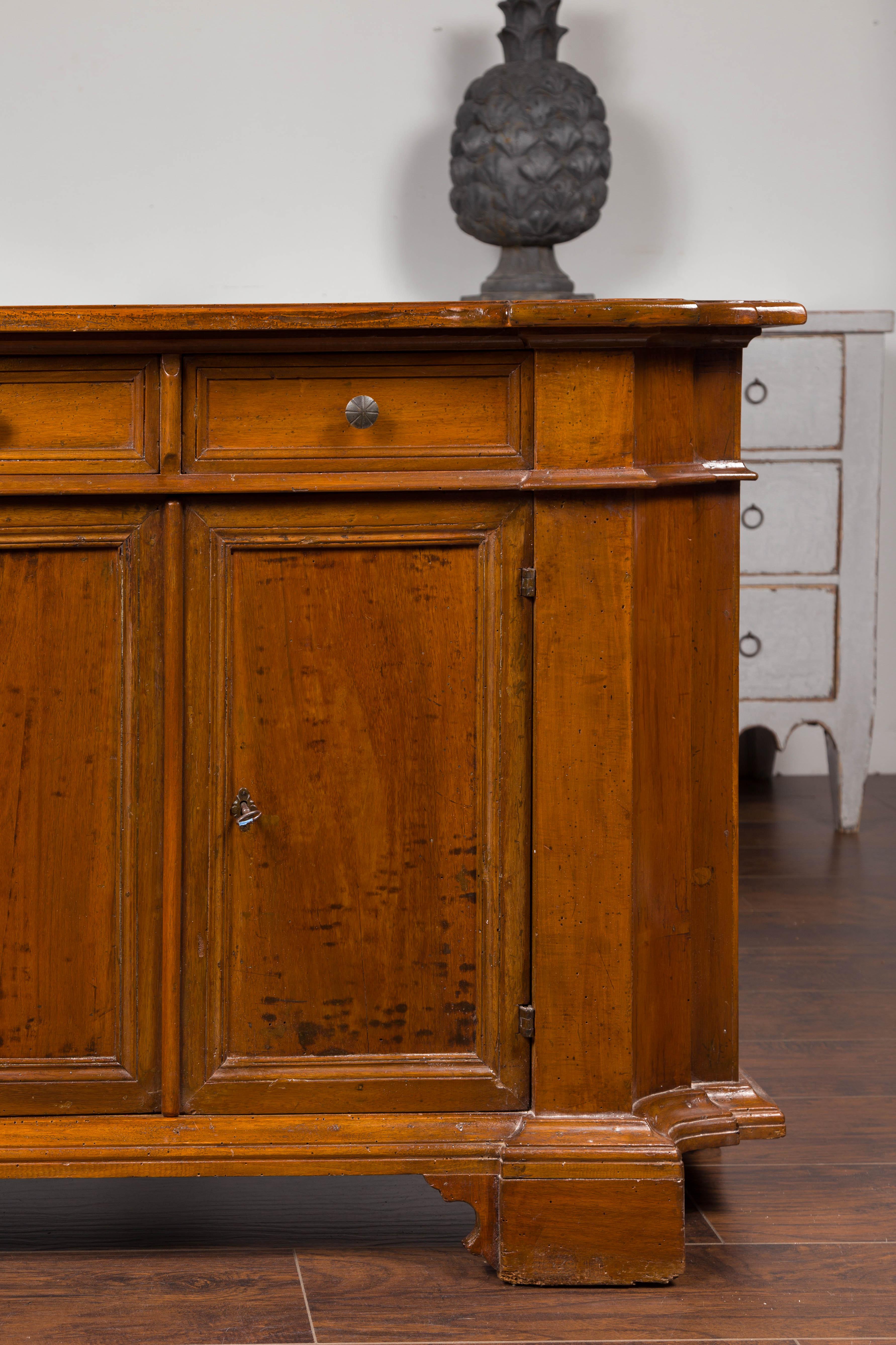 Italian Walnut Credenza with Drawers over Doors and Curving Sides, circa 1860 3