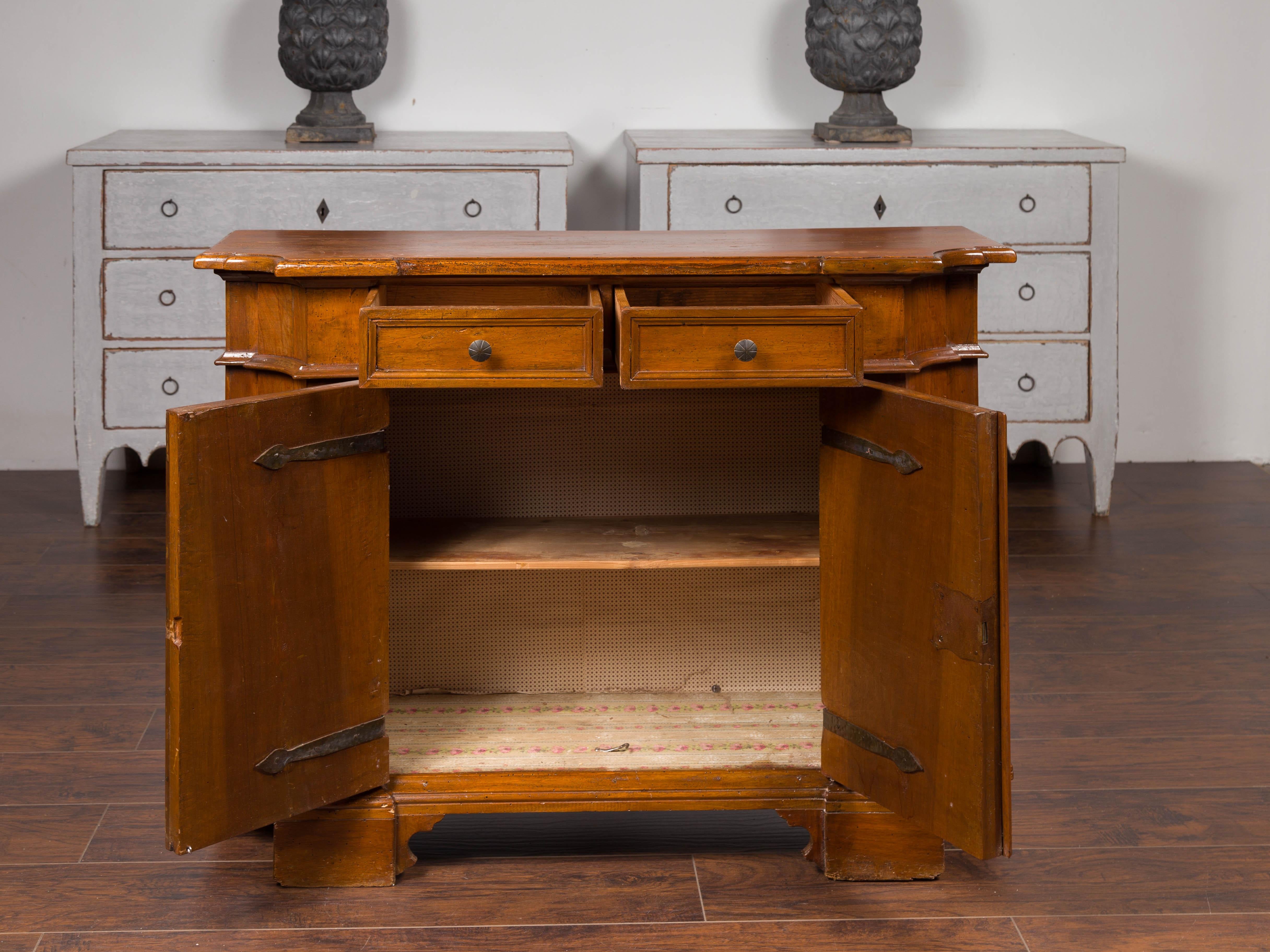 Italian Walnut Credenza with Drawers over Doors and Curving Sides, circa 1860 4
