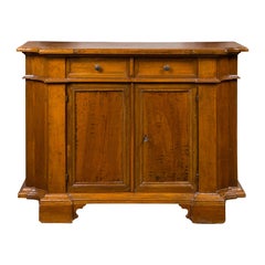Italian Walnut Credenza with Drawers over Doors and Curving Sides, circa 1860