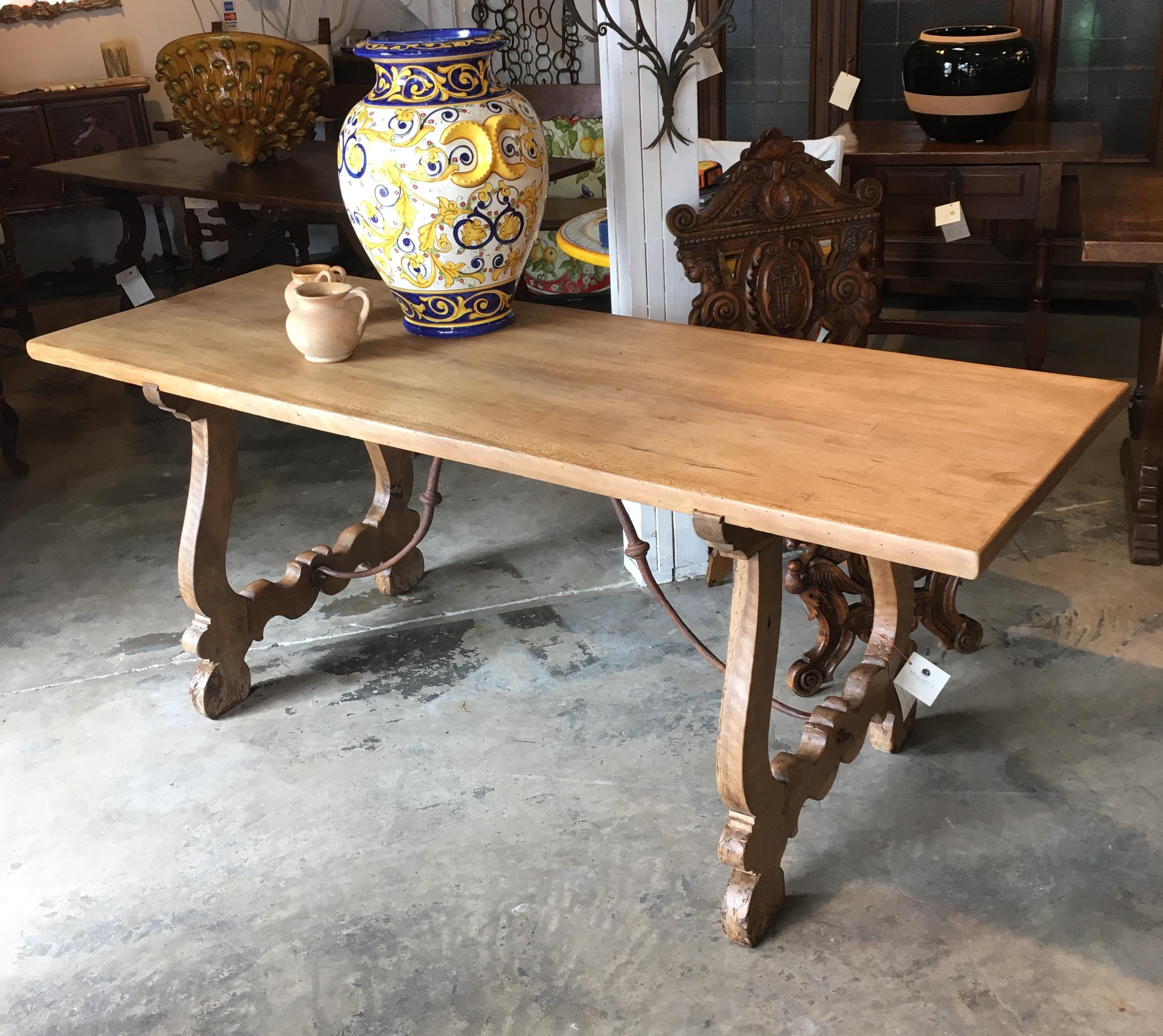 SOLD! HOWEVER, AVAILABLE TO CUSTOM ORDER

Our Primo Collection of Tuscan & Renaissance Antiques, featuring restored, ancient Italian walnut. Hand-hewn in the mid 1800's from a single, solid slab of ancient Italian walnut, with carved lyre shaped