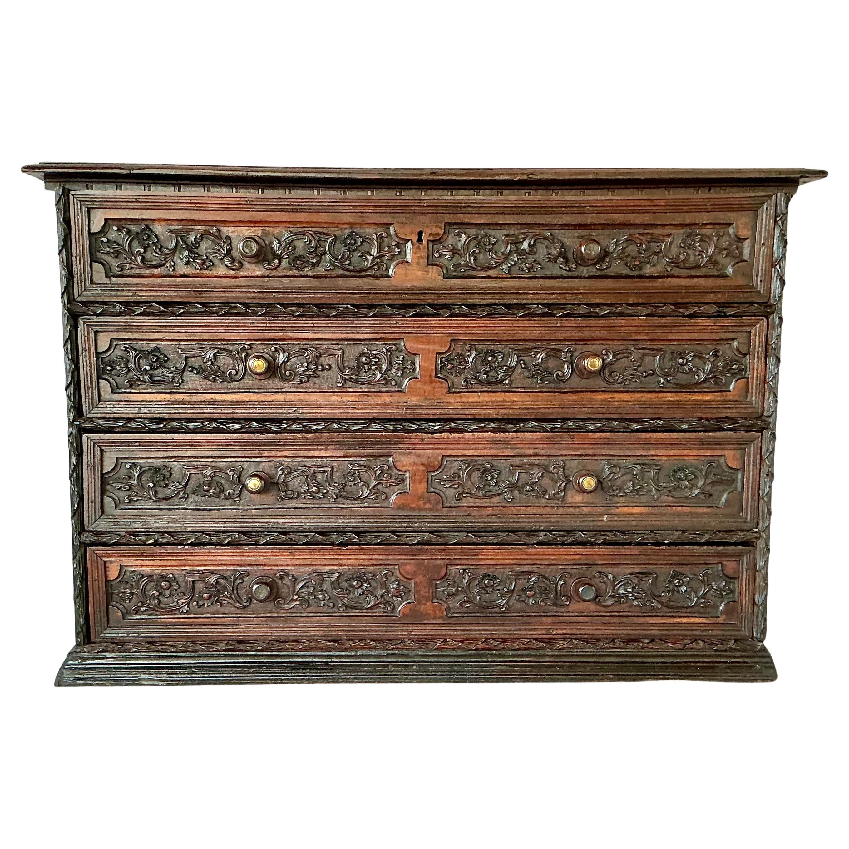 Italian Walnut Four Drawer Carved Walnut Commode Early 18th Century In Good Condition For Sale In Bradenton, FL
