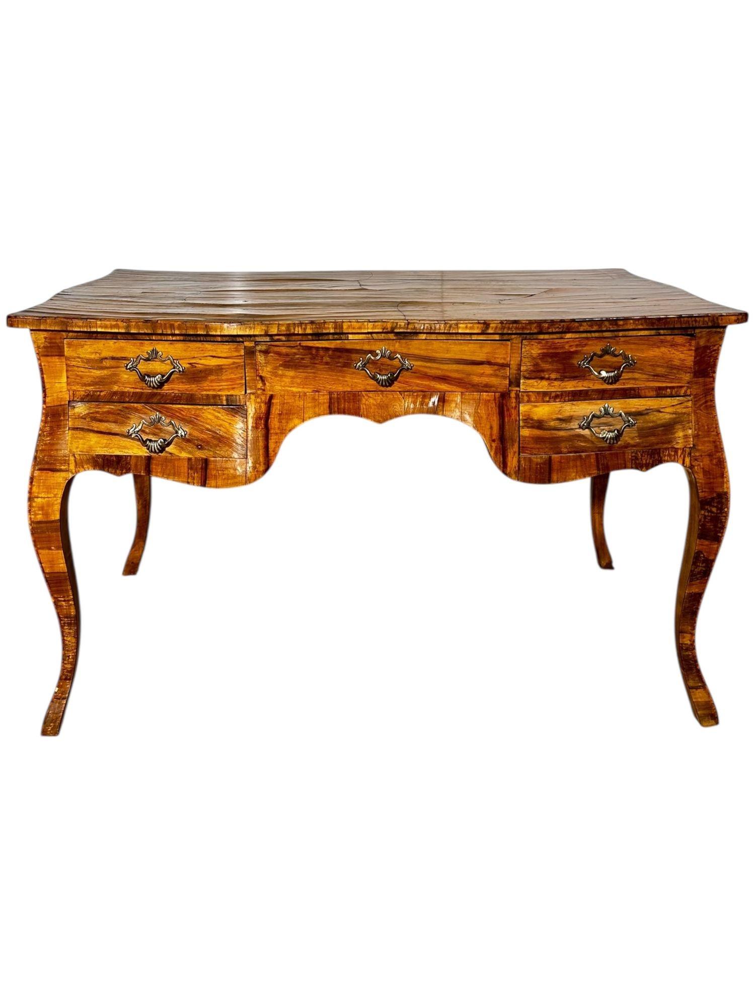 Italian Walnut Louis XV Bombay Style Writing Desk, 1960s.  Desk is in original condition with antiqued brass hardware.
Measures 31” tall 50.25” wide 28.5” deep