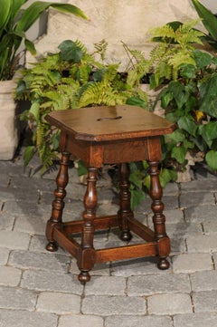 Italian Walnut Stool with Splayed Legs and Pierced Handle from the 1820s