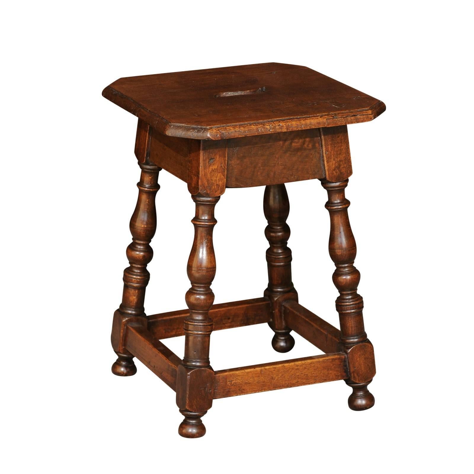 Italian Walnut Stool with Splayed Legs and Pierced Handle from the 1820s
