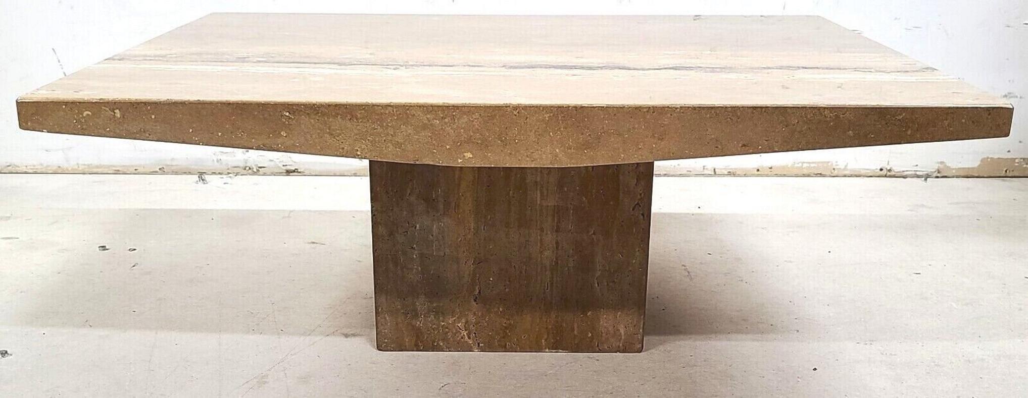 Offering one of our recent palm beach estate fine furniture acquisitions of a
Italian walnut travertine marble coffee cocktail table by Stone International
The spectacular natural appearance of the marble makes it look like the surface of an alien