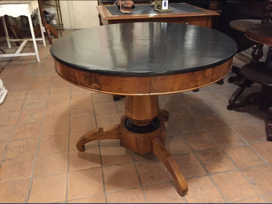 Italian walnut tripod table with little drawer and black coated top from 1920s.