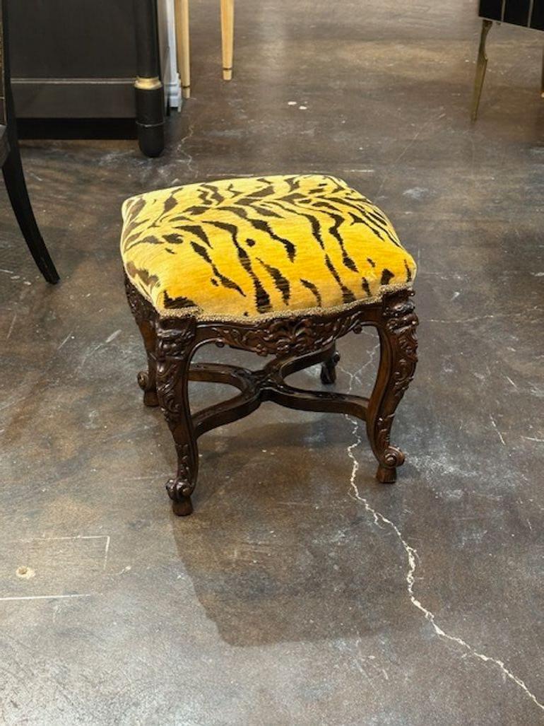Late 19th century Italian carved walnut stool with tiger velvet. Circa 1890. A favorite of top designers!