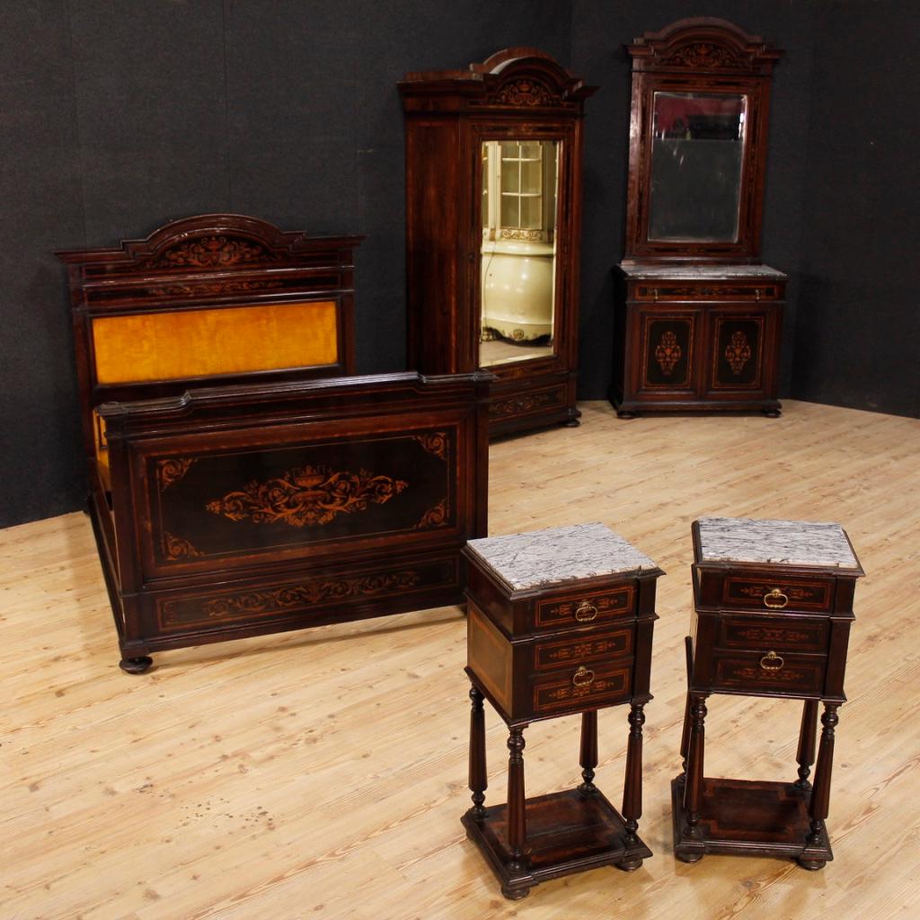 Italian wardrobe from the first half of the 20th century. Exceptionally high quality furniture inlaid in walnut, rosewood, mahogany, paliander, maple and fruitwood. Armoire with one door and an external drawer of excellent capacity and service.