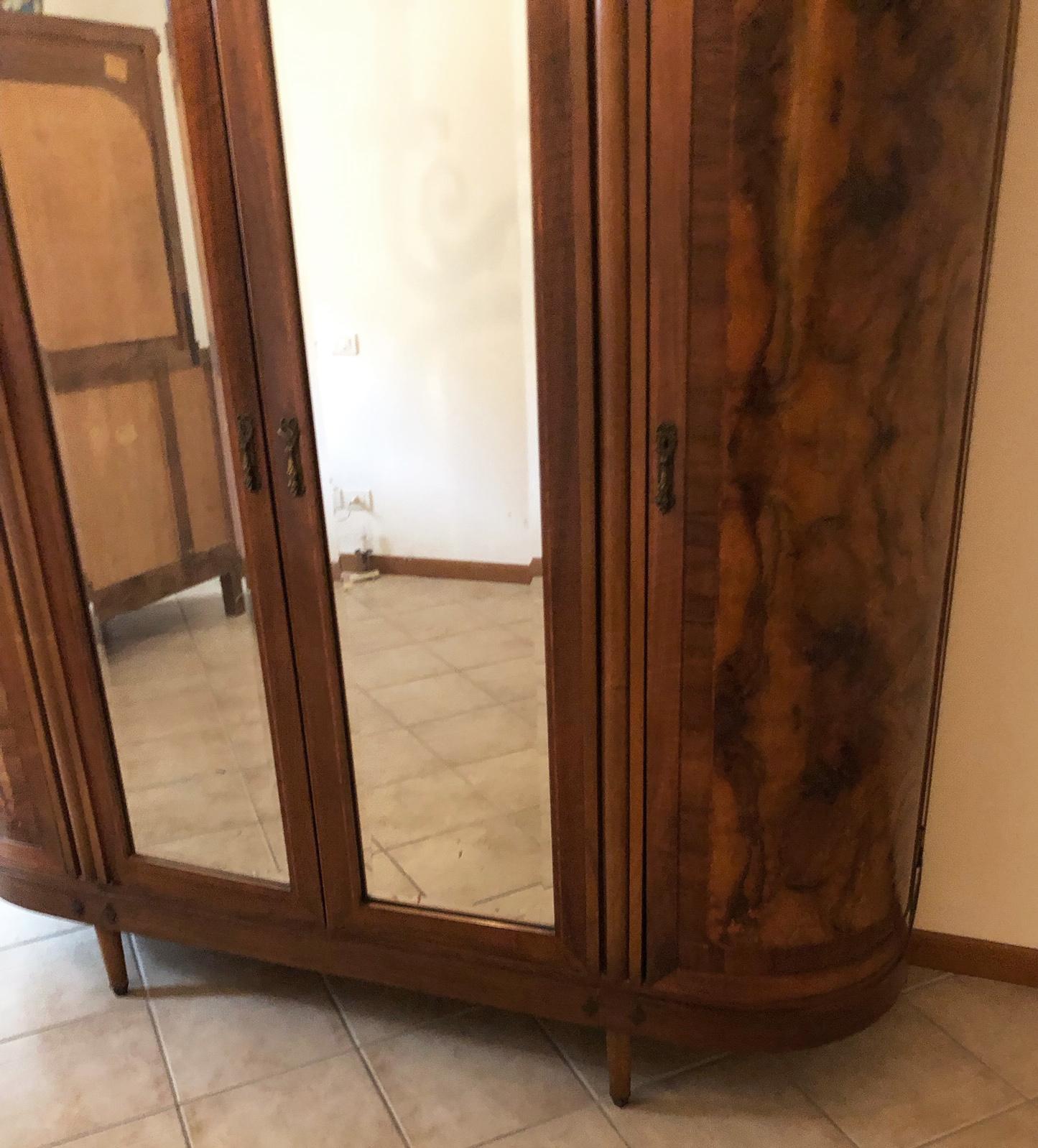 20th Century Italian wardrobe with three doors, in walnut, curved on the sides, art deco For Sale