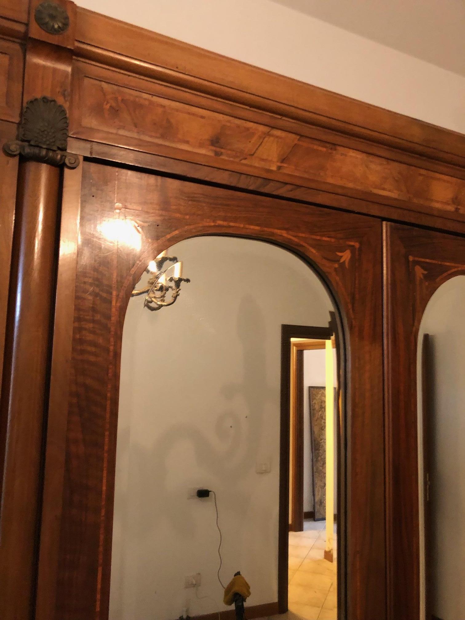 Mirror Italian wardrobe with three doors, in walnut, curved on the sides, art deco