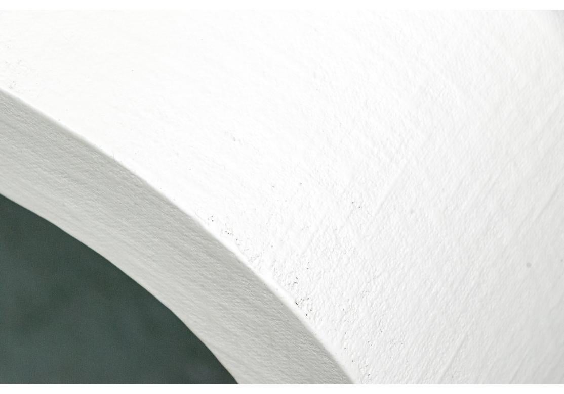 Exceptional and fine Italian Waterfall Console Table with Linen surface us tomb painted in a custom Creme tone paint with a softly polished Eggshell finish. The Table with excellent proportions and fine lightly textured feel. 

Dimensions: 63” wide