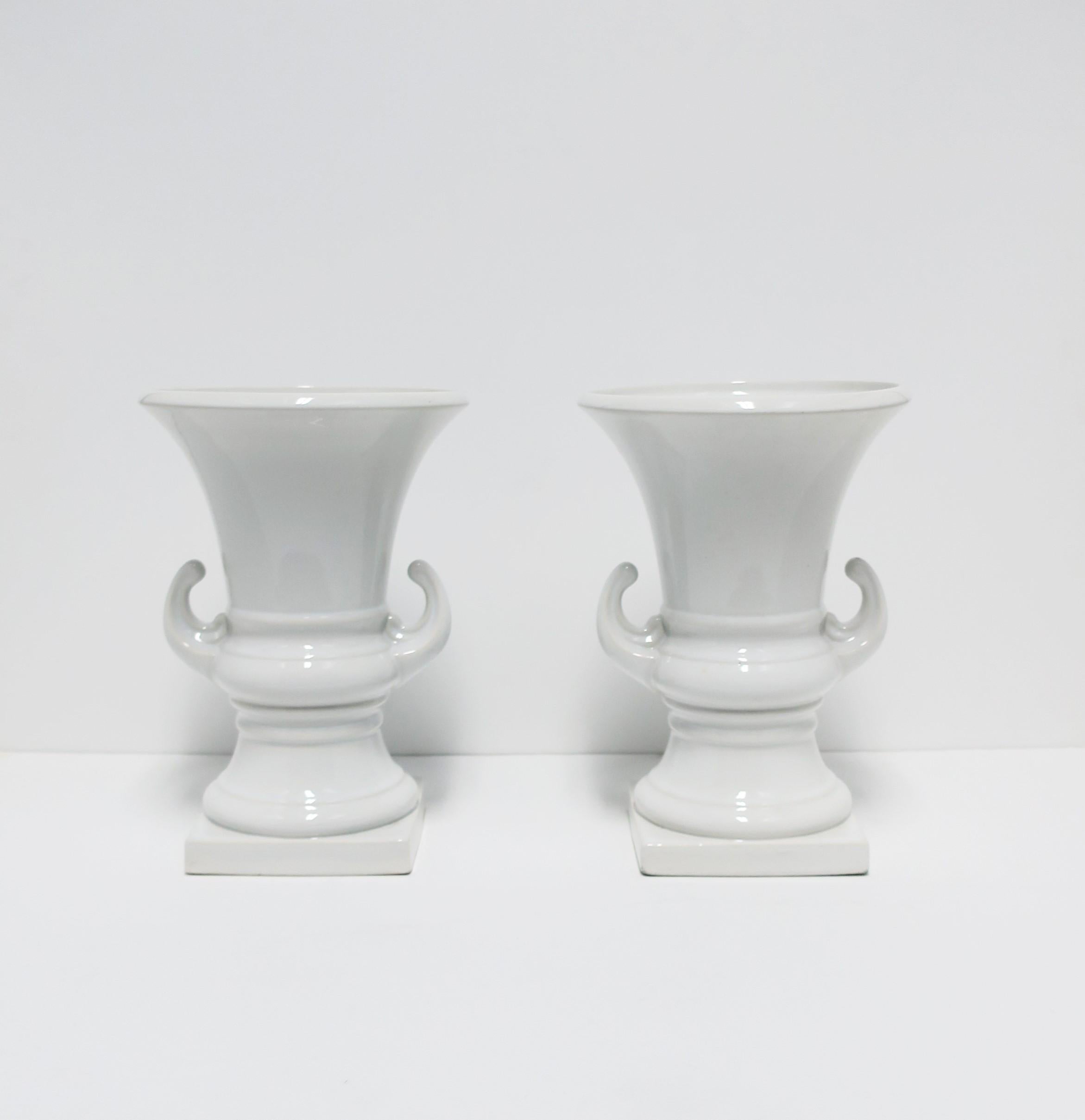 white ceramic urns