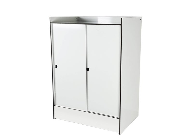 Italian White Laminated Plastic Storage Unit with Shelves and Sliding Doors for La For Sale at