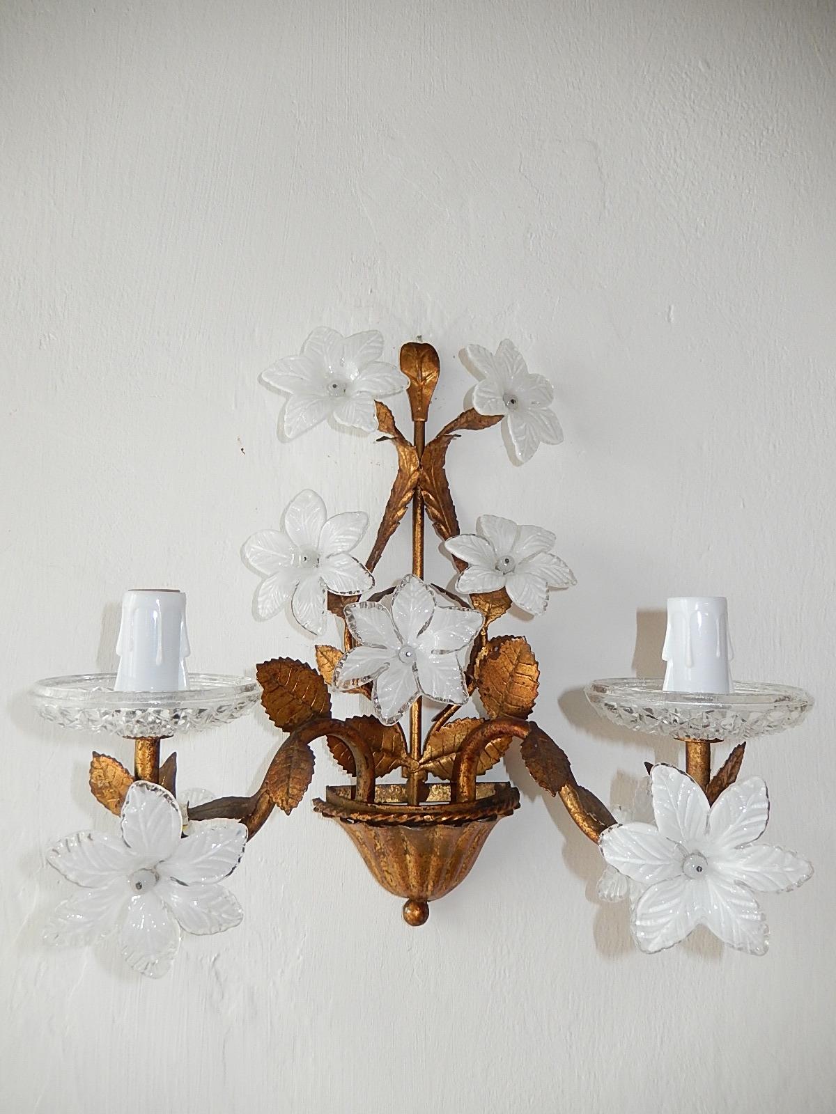 Will be rewired and ready to hang with appropriate country sockets. Housing 2 lights each, sitting in crystal cut bobeches. Tole sconces with great details and patina. Adorning big white opaline Murano flowers and beads. Free priority UPS shipping