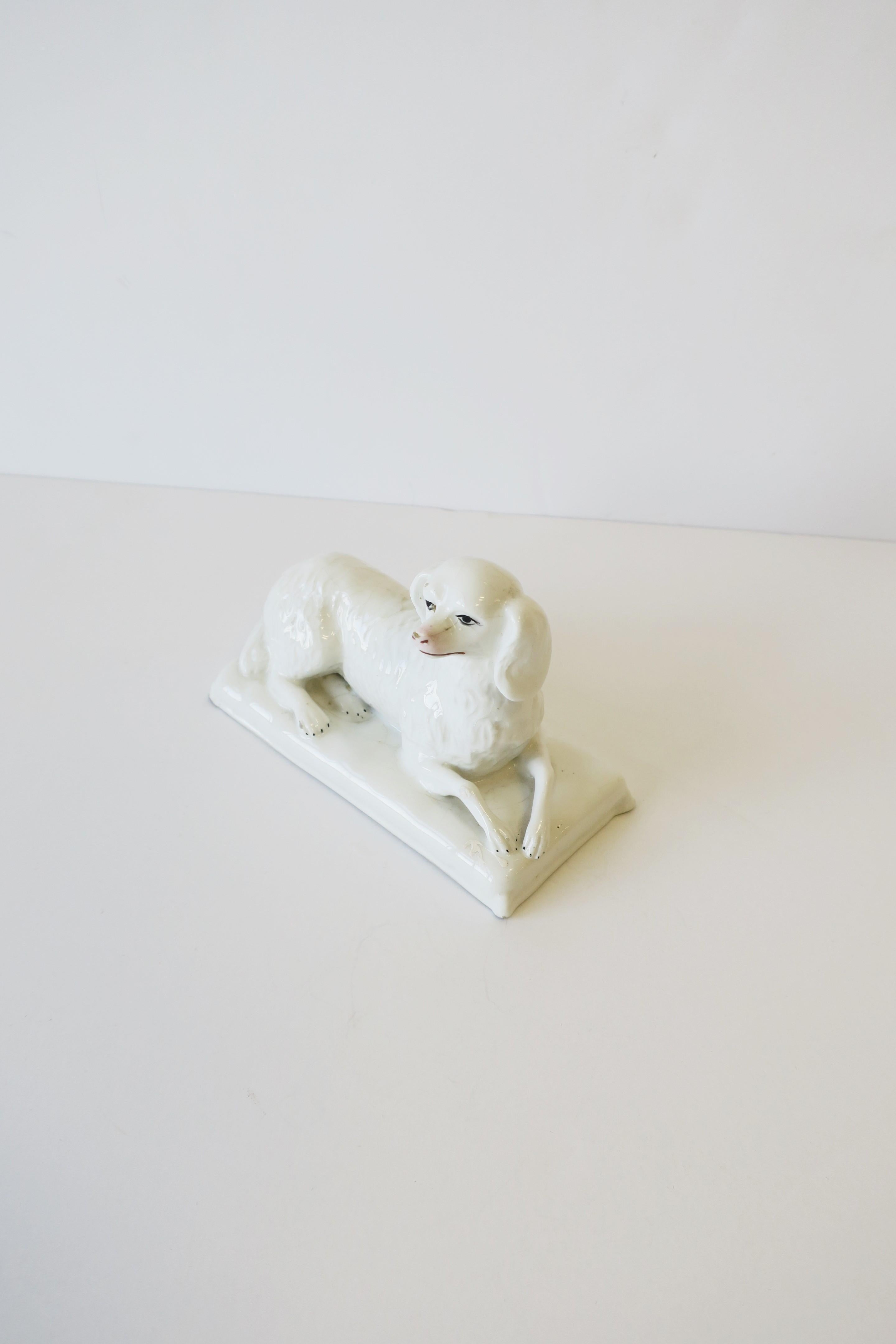 white porcelain dog statue