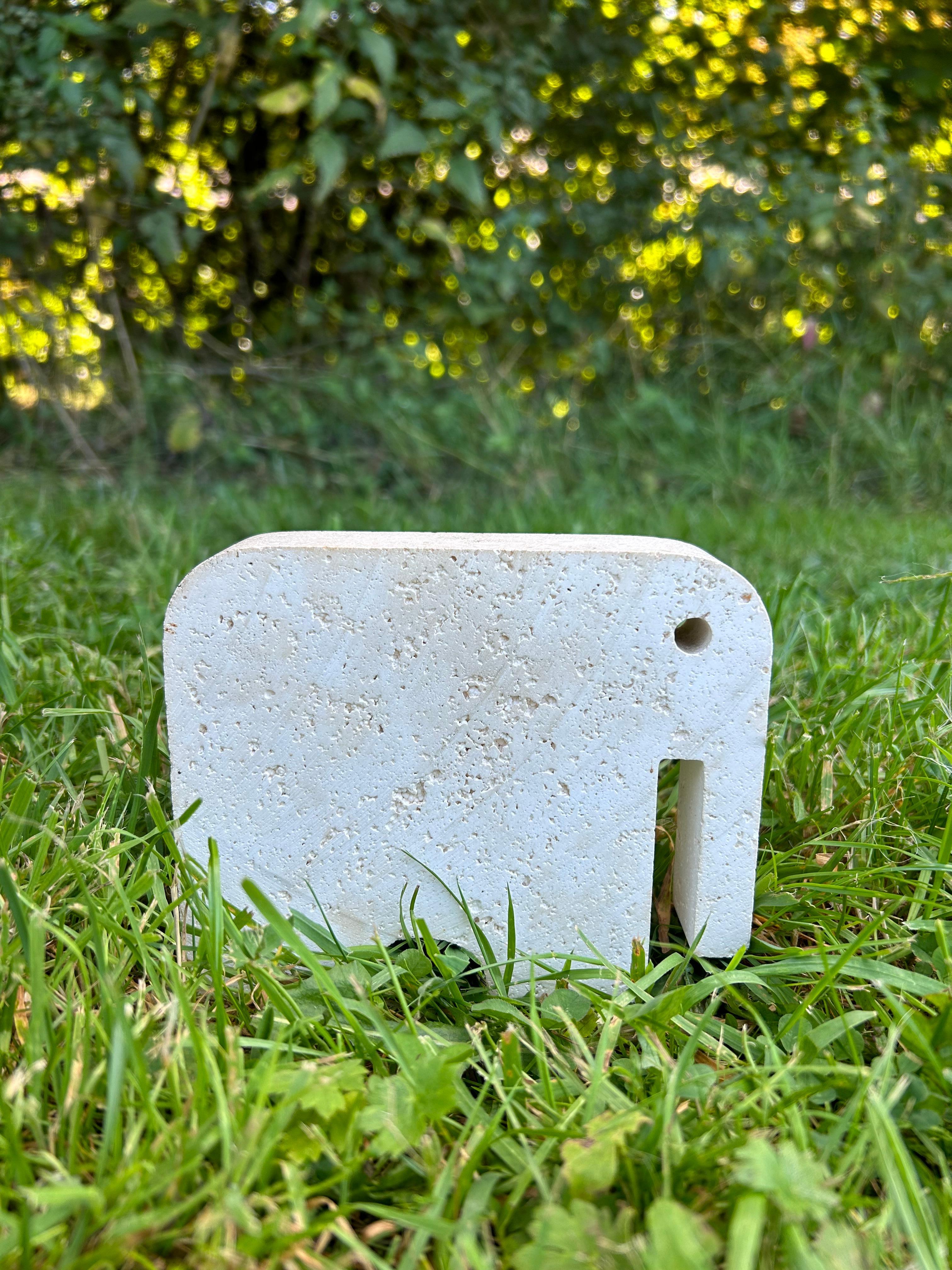 Elephant sculpture designed by Enzo Mari and produced by Fratelli Mannelli in Italy in the early 1970s.
Handcrafted from a single block of white travertine, this piece reflects Mari’s minimalist aesthetic and the refined craftsmanship of the