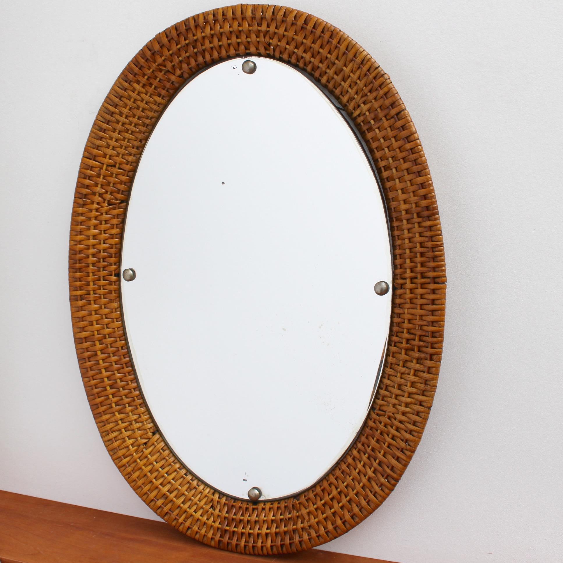 Mid-20th Century Italian Wicker Rattan Oval-Shaped Wall Mirror, circa 1960s