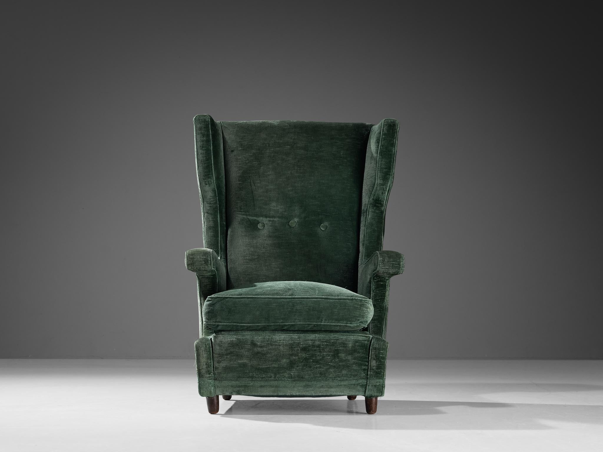 green velvet wingback chair