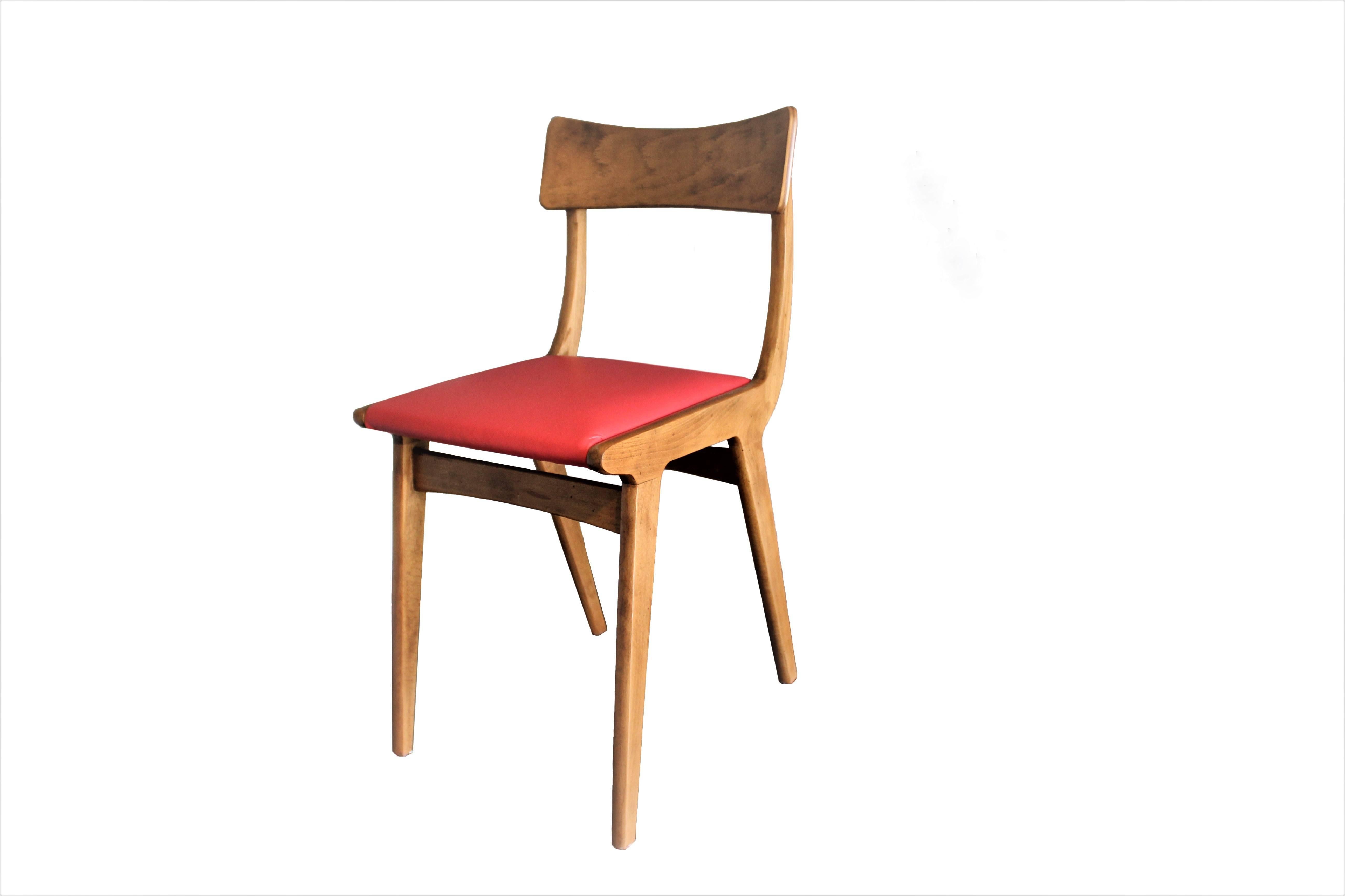 Set of two wood chairs, the cushion is restored in red leather.
Made in Italy, circa 1950.