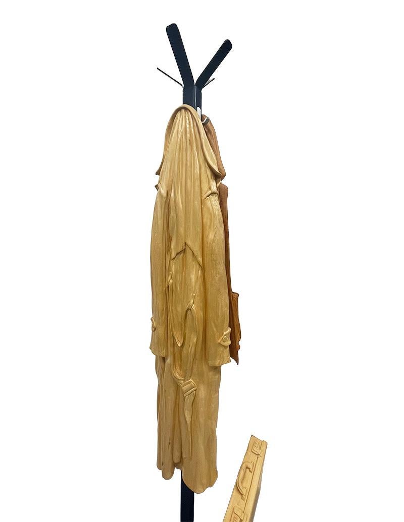 20th Century Italian wood-carved sculptures with raincoat and jacket on metal coat rack For Sale