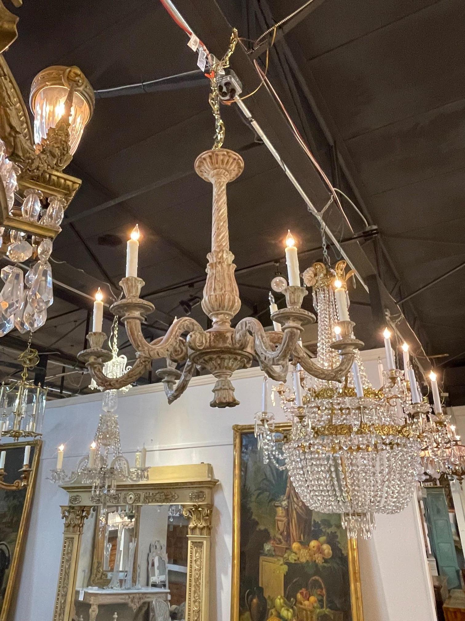 19th century Italian carved and painted 6 light chandelier, Circa 1880.
The chandelier has been professionally re-wired, cleaned and is ready to hang. Includes matching chain and canopy.