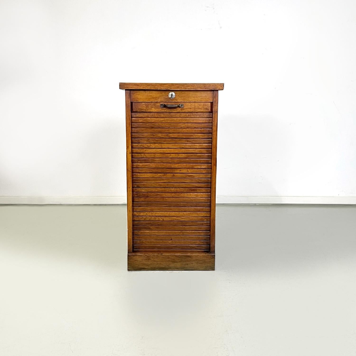 Mid-20th Century Italian wooden archive cabinet with a shutter opening and metal handle, 1940s For Sale