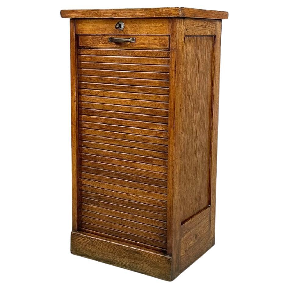 Italian wooden archive cabinet with a shutter opening and metal handle, 1940s For Sale