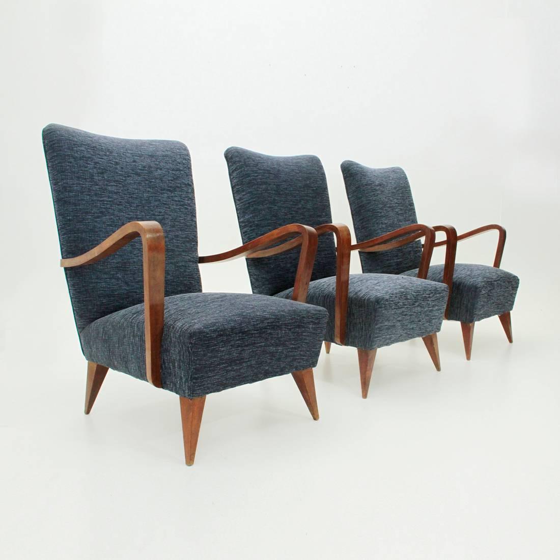 Set of three Italian armchairs produced in the 1940s.
Wooden structure padded and lined with new fabric.
Legs and armrests in wood.
Good general conditions, some signs due to normal use over time.

Dimensions: Width 69 cm, depth 80 cm, height