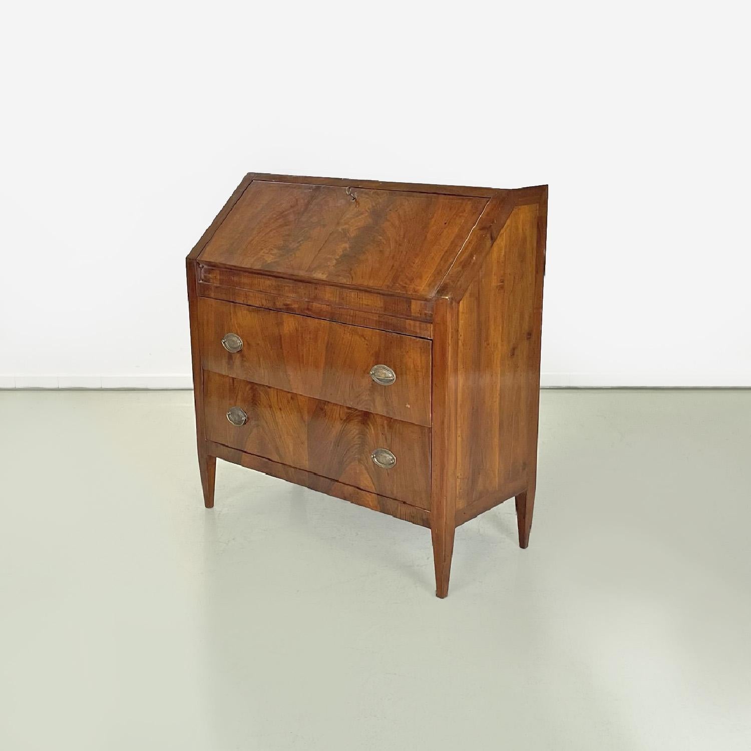 Italian wooden chest of drawers or writing desk with flap, 1900s
Chest of drawers with flap with rectangular base entirely in wood. In the upper part under the flap top there are four small drawers with worked brass knobs and a central door with
