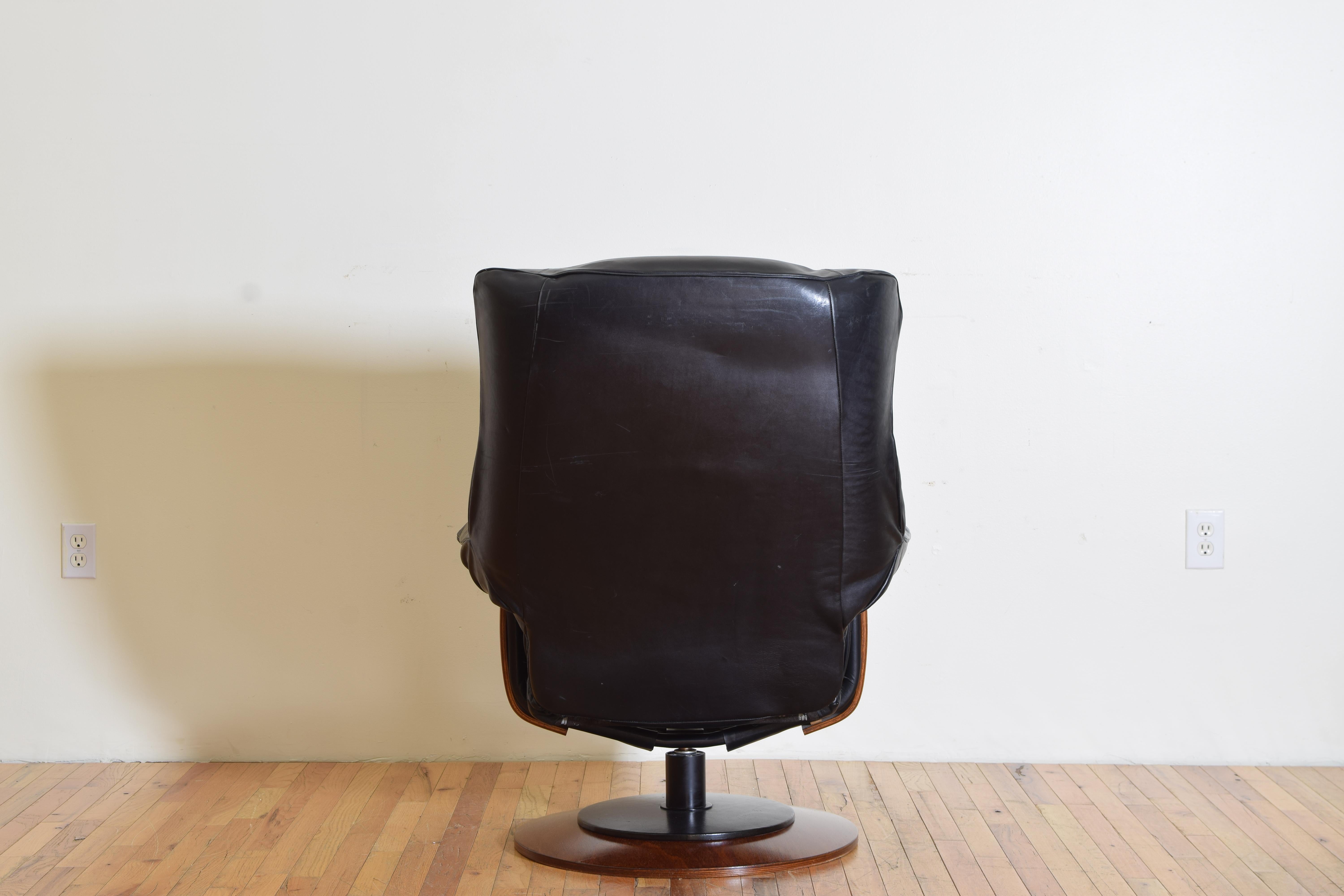 Late 20th Century Italian Wooden & Flat Black Leather Upholstered Reclining Armchair & Ottoman
