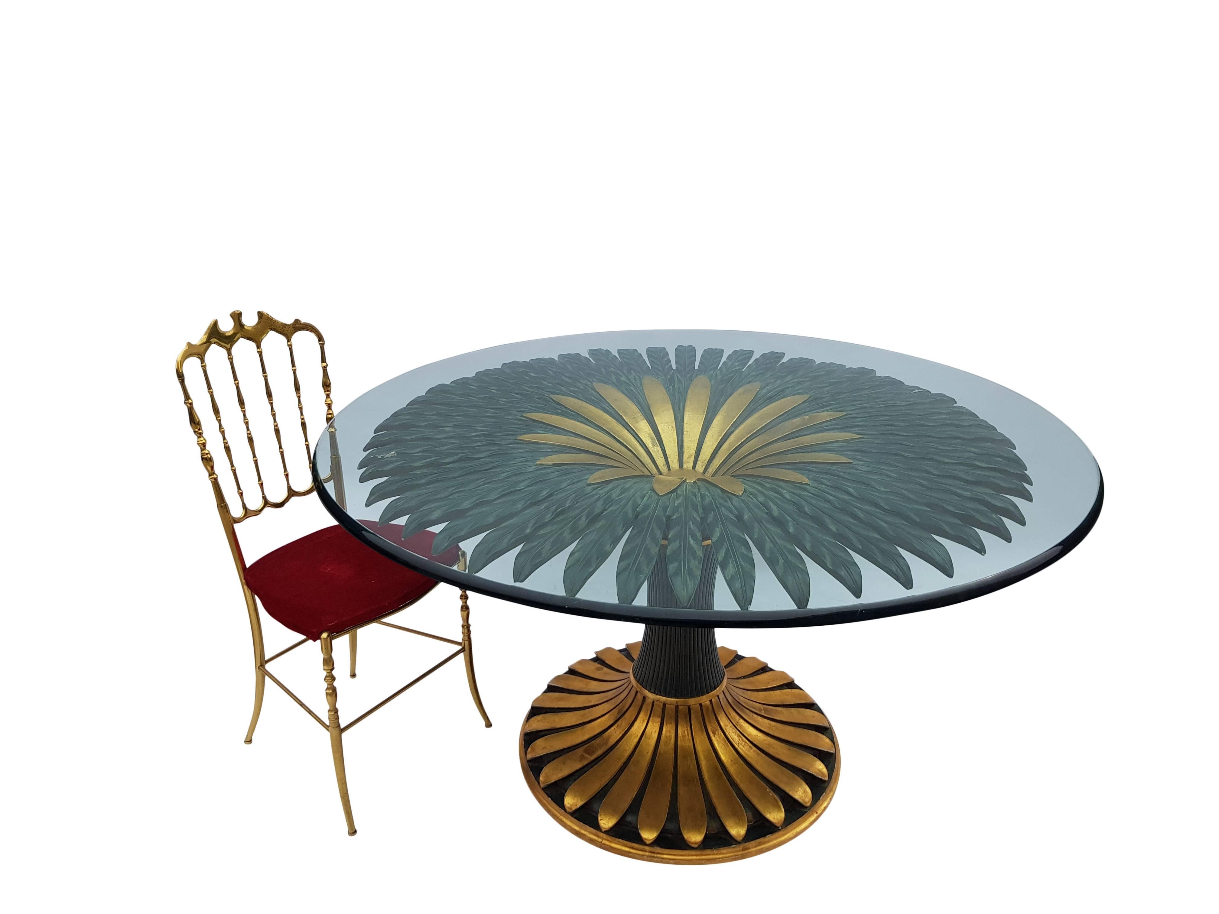 Stunning Italian hand-carved wooden dining table in green and gold.
The table has a thick high quality glass (2cm)
Beautiful to combine in an interior with Willy Rizzo, Maison Jansen, Romeo Rega etc.