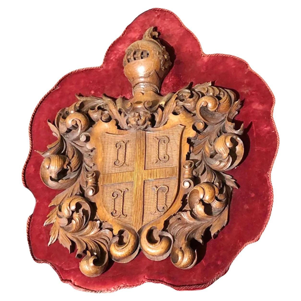 Carved Wooden Shield With Knight and Heraldic Carvings