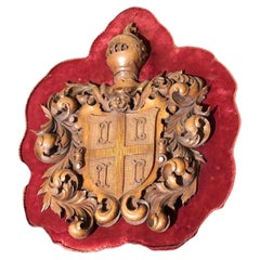 Carved Wooden Shield With Knight and Heraldic Carvings