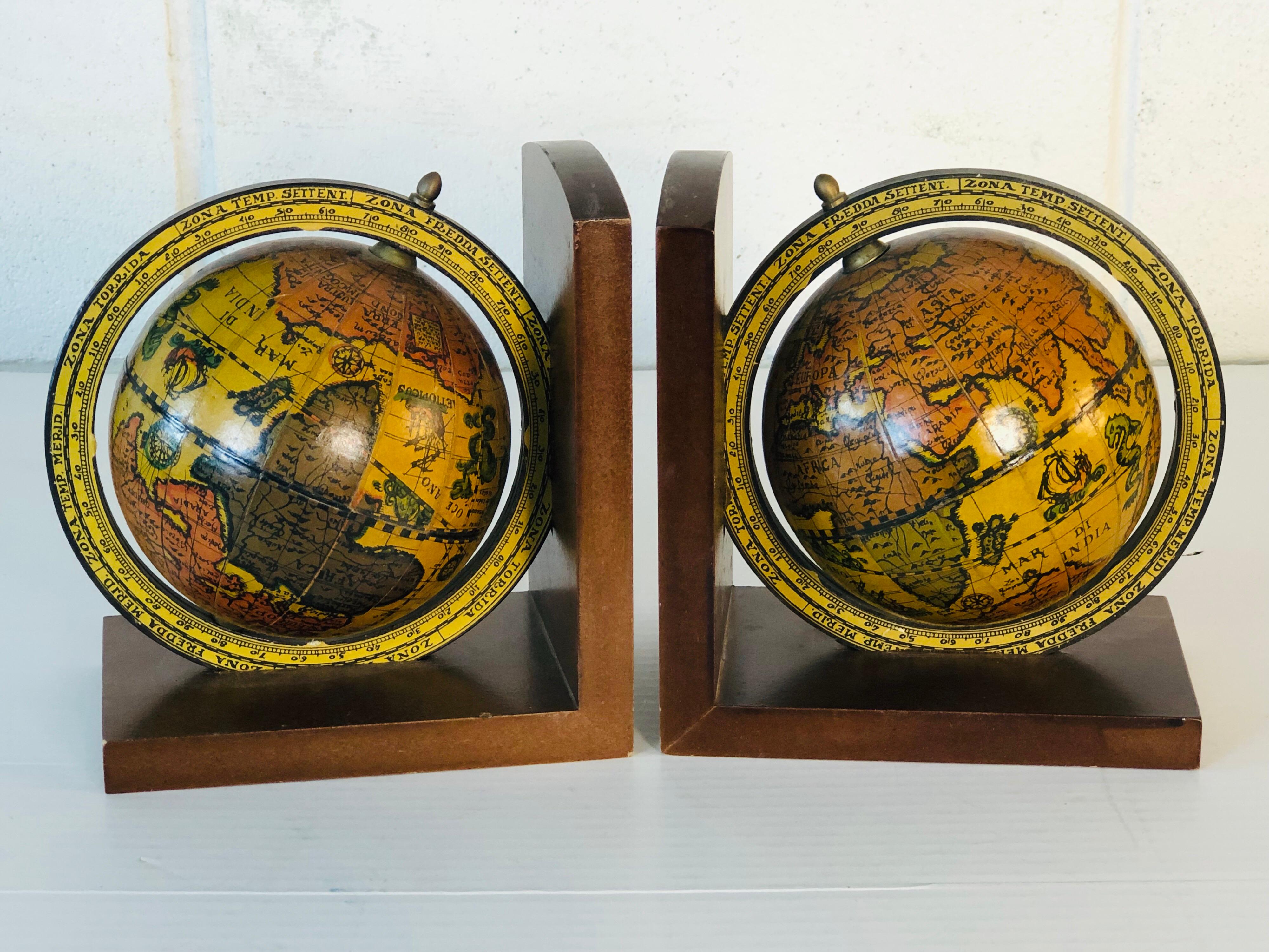 Pair of world globe wood bookends made in Italy. Marked. Excellent condition.