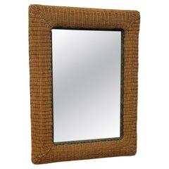 Specchio italiano in rattan intrecciato, anni '70