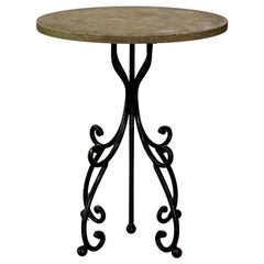 Table d'appoint ronde en fer forgé italien et plateau en pierre
