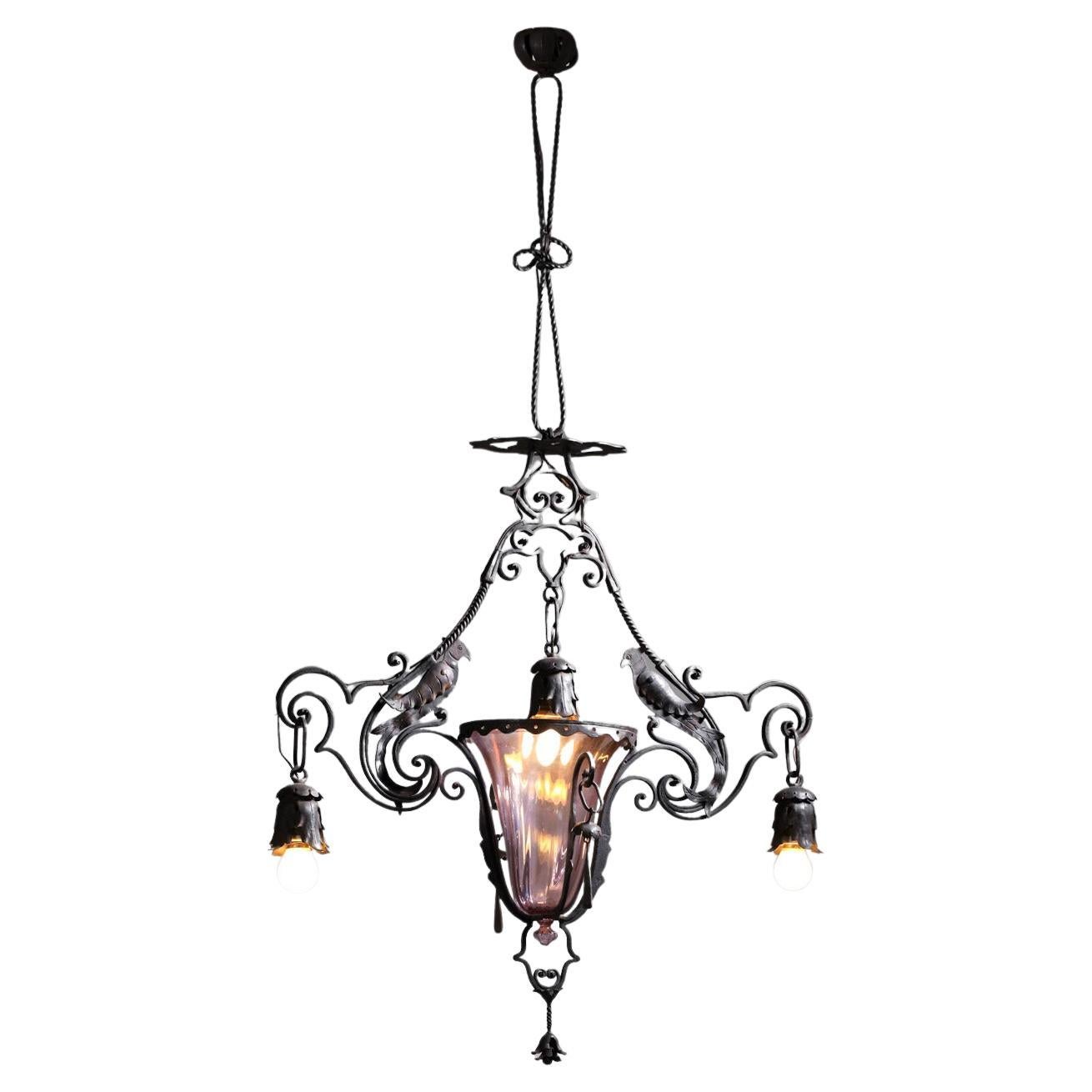 Lampadario italiano in ferro battuto di Carlo Rizzarda anni 
20 in vendita