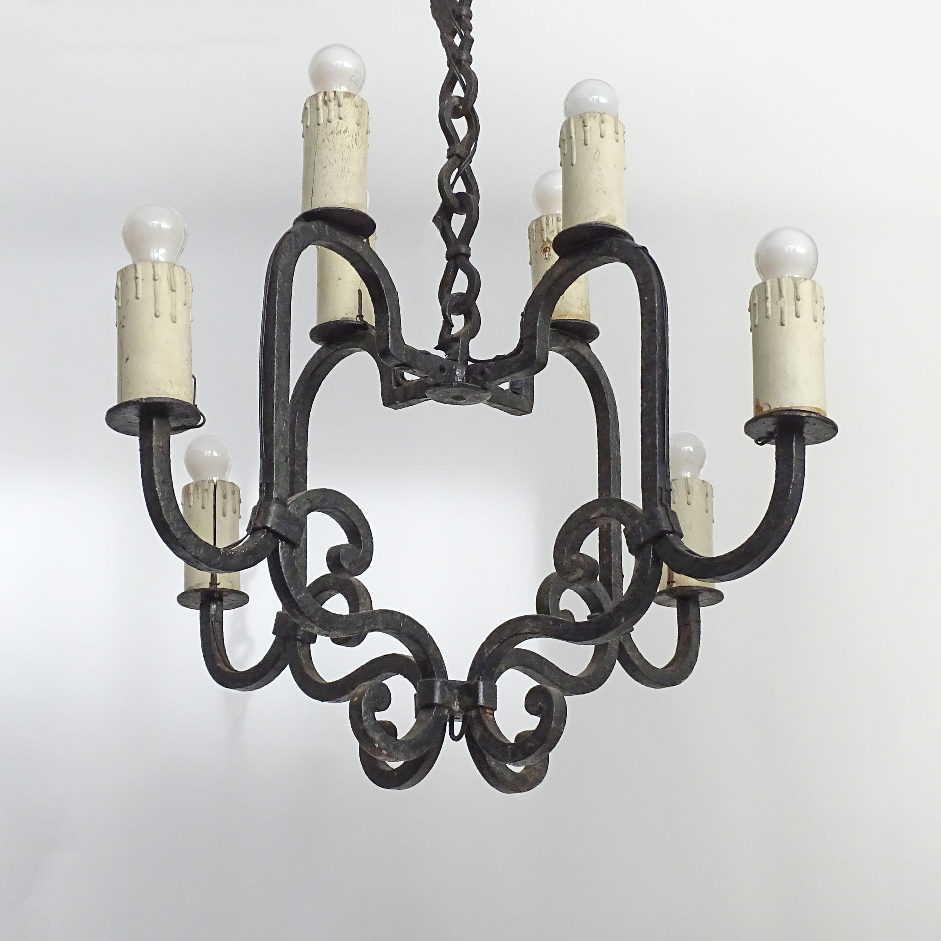 Italian Wrought Iron Eight Lights Rustic Ceiling Lamp In Good Condition For Sale In Milan, IT