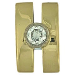 Pendentif solitaire italien en or jaune et blanc de 0,65 carat