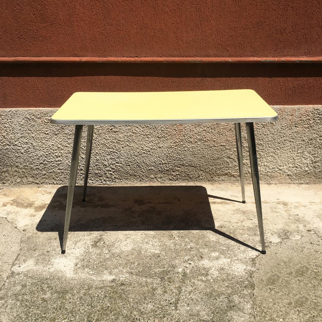 Italian yellow laminate and chromed steel kitchen table, 1960s
Yellow formica kitchen table dating to the 1960s, with edges and legs in chromed steel.
Good condition, in patina.
60x101x78h cm