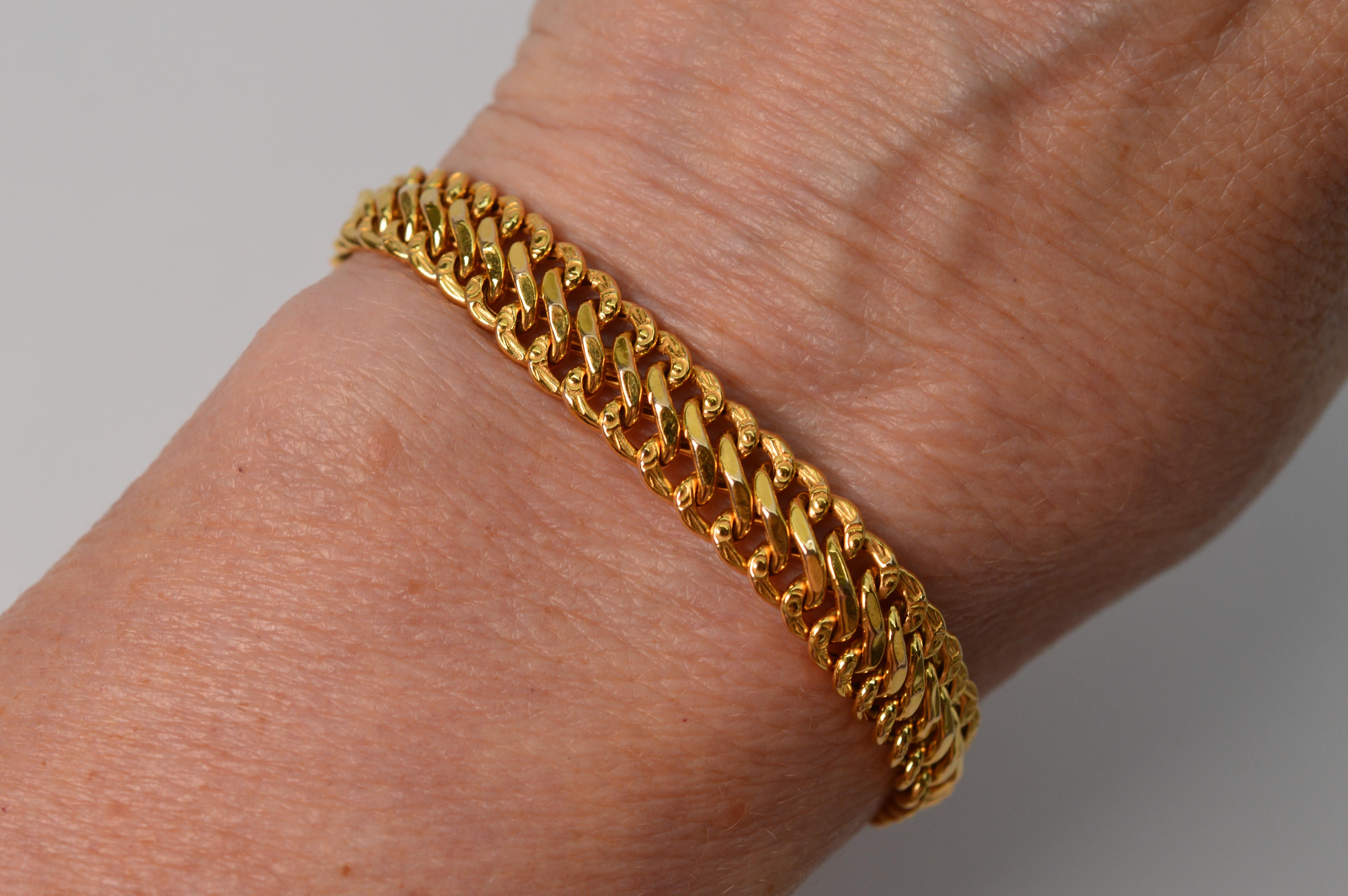 Versatile fourteen karat 14K Italian-made yellow gold chain bracelet fabulous to wear on its own or just the right width for stacking. The fancy Bismarck style chain gives this piece a stylish, dressy look. The bracelet's length is 7 1/2 inches and