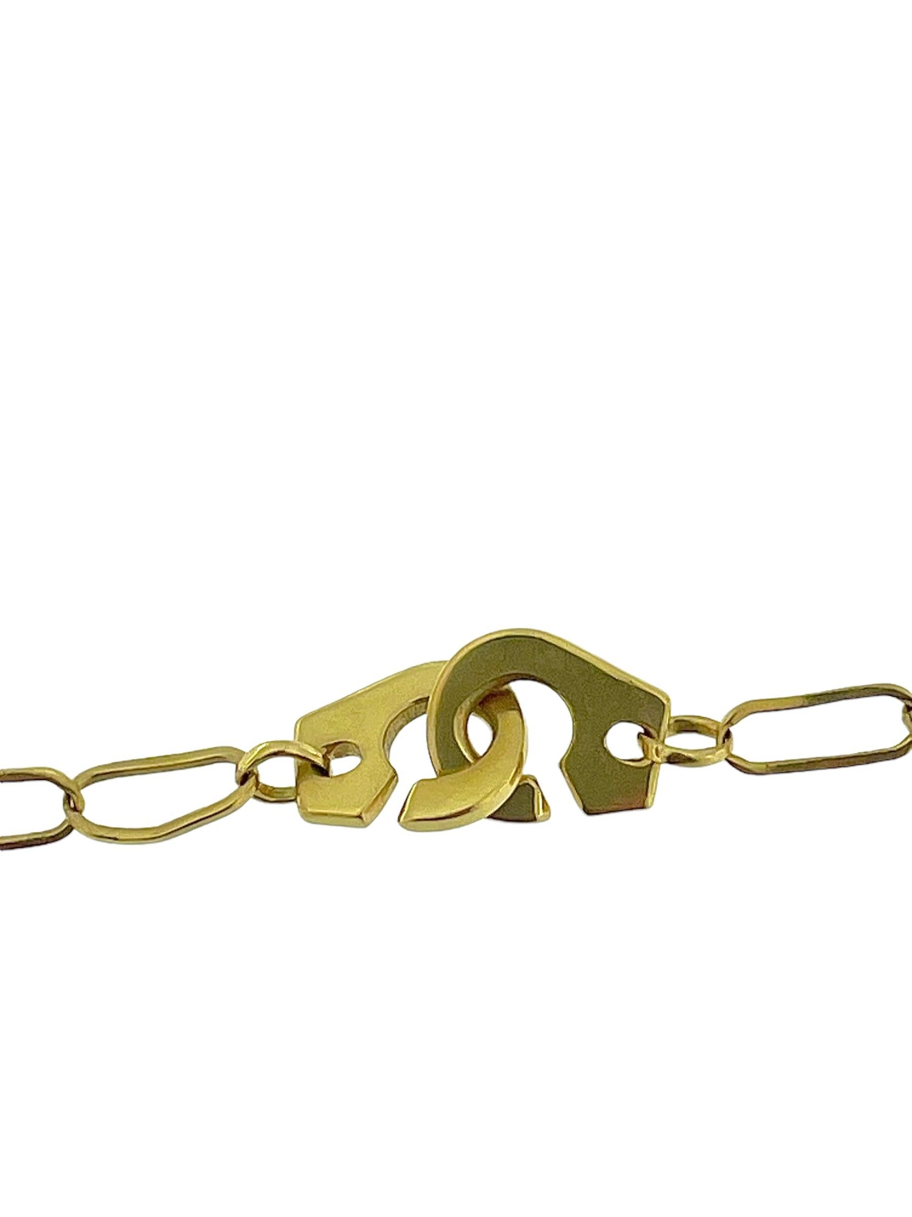 The Italian Yellow Gold Link Necklace by Chimento is a bold and stylish piece of jewelry that combines Italian craftsmanship with contemporary design. Crafted from 18-karat yellow gold, this necklace features a unique handcuff-inspired pendant