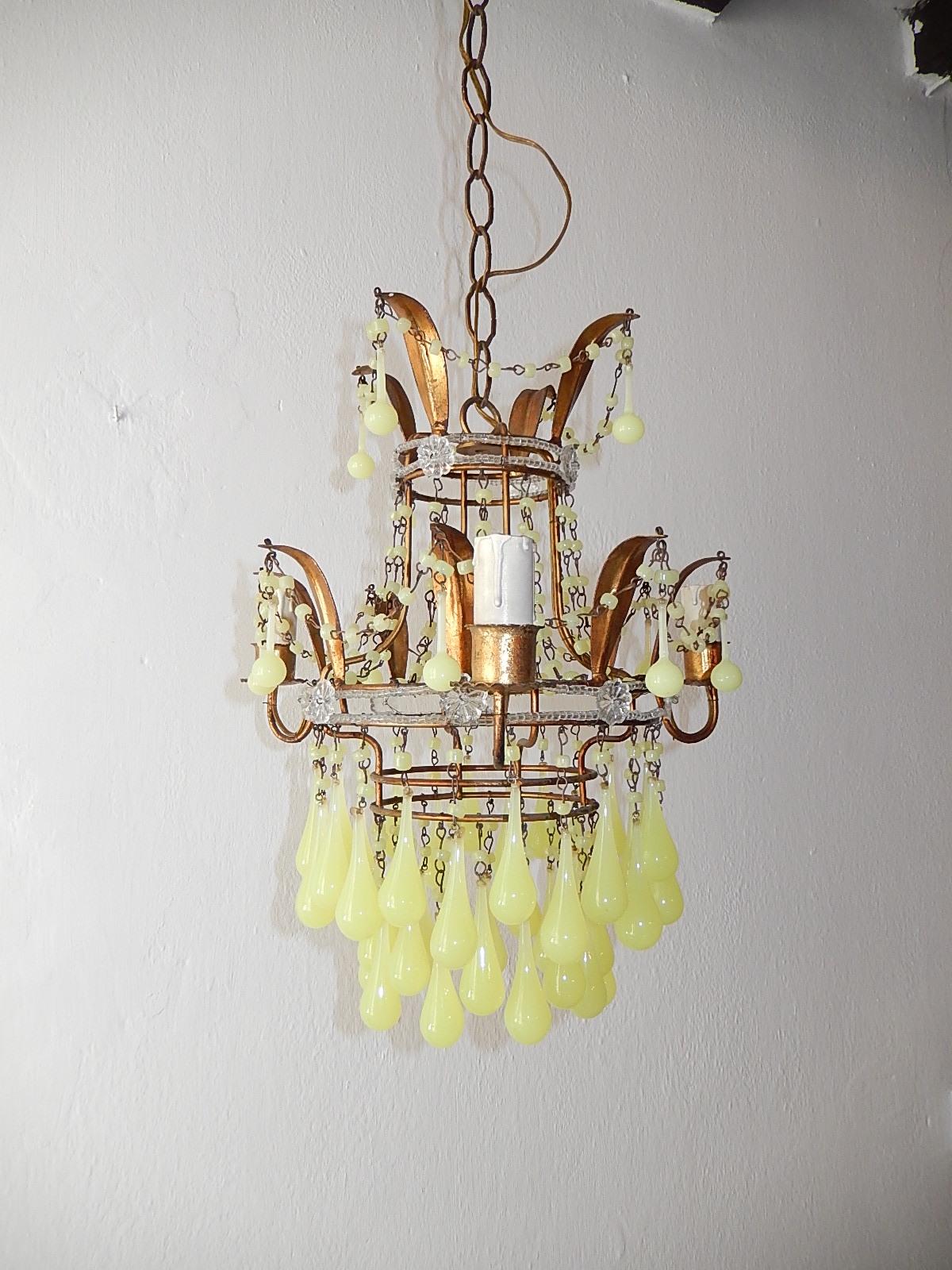 Housing 3-light.  Will be rewired with certified US UL sockets for the USA and appropriate sockets for all other countries and ready to hang!  Gilt metal body with tiny beading and florets. Gilt metal with swags of yellow opaline Murano beads and